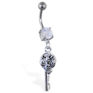 Navel ring with dangling key with multiple skulls
