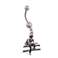 Jeweled belly ring with dangling cowboy on fence